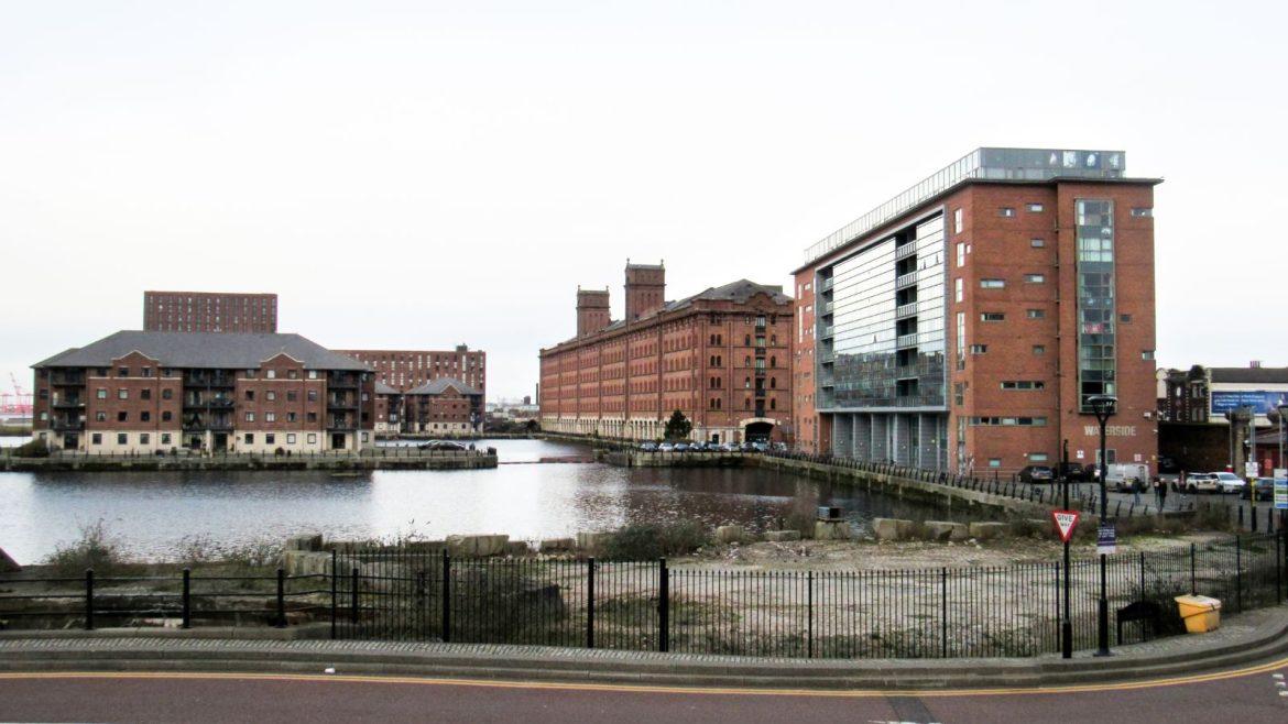 Historic warehouse buildings and water channels at Liverpool’s Royal Albert Dock